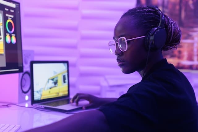 woman sitting in front of a computer